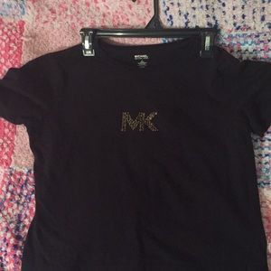 It is a Michael Kors shirt it’s been worn once
